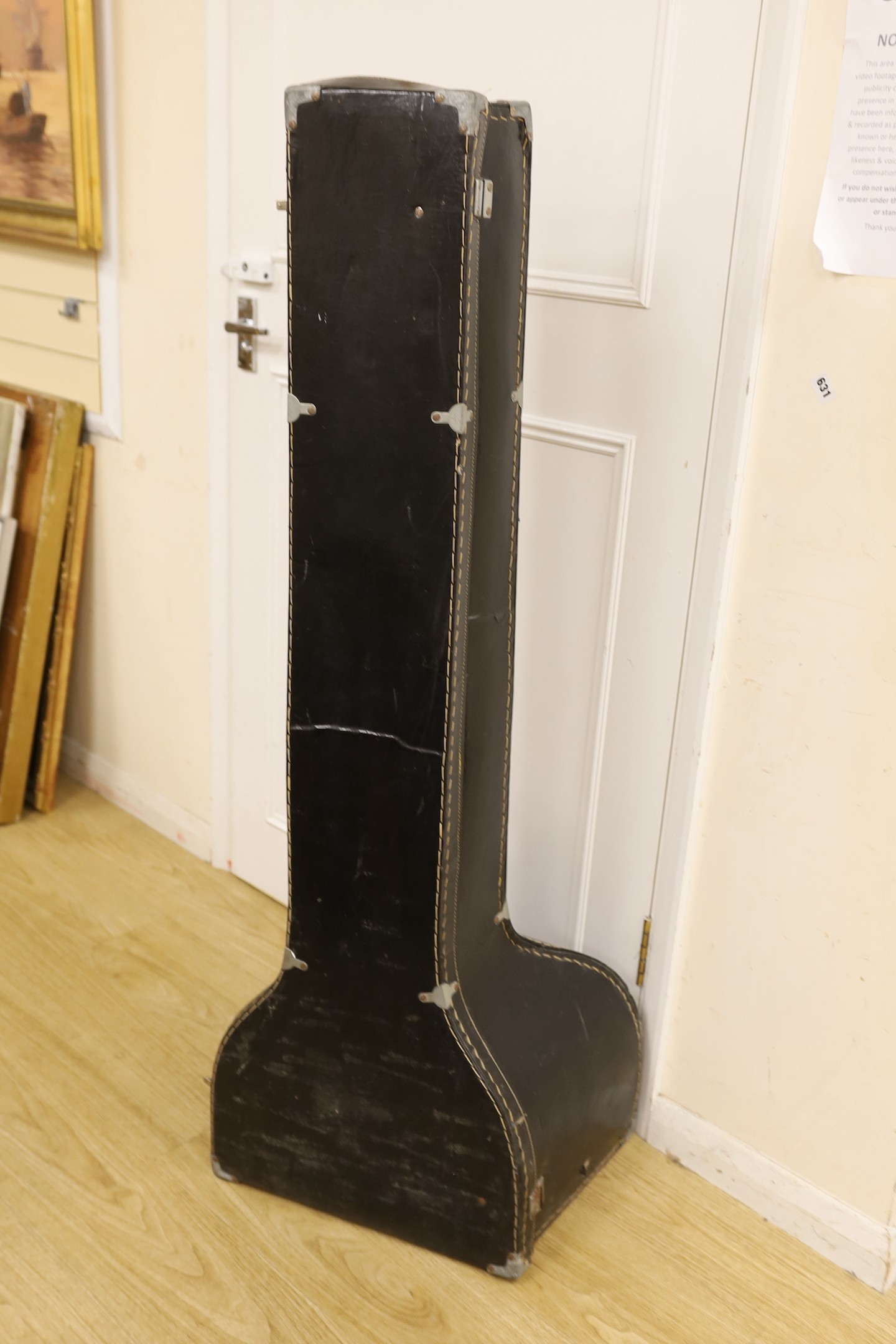 An Indian Sitar (in need of repair) with hard case, 123cms high.